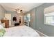 Primary bedroom with en suite bathroom and walk-in closet at 1410 21St W St, Bradenton, FL 34205