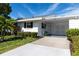 White single story home with carport and landscaping at 4510 Mount Vernon Dr, Bradenton, FL 34210