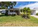 Front view of a single story home with lush lawn at 4510 Mount Vernon Dr, Bradenton, FL 34210