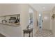 Kitchen entry with granite countertop and view to patio at 4521 Kingsmere # 6, Sarasota, FL 34235