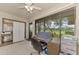 Home office with built-in storage and view of golf course at 4521 Kingsmere # 6, Sarasota, FL 34235