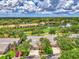 Aerial view of community with golf course and canal at 4521 Kingsmere # 6, Sarasota, FL 34235