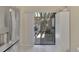 View of private patio from kitchen, accessible through sliding doors at 4521 Kingsmere # 6, Sarasota, FL 34235
