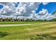 Community view, showcasing homes and golf course at 4521 Kingsmere # 6, Sarasota, FL 34235