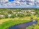 Aerial view of property and surrounding golf course at 4521 Kingsmere # 6, Sarasota, FL 34235