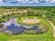 Aerial view of golf course and residential area at 4521 Kingsmere # 6, Sarasota, FL 34235