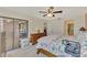 Large bedroom with king-size bed and access to patio at 4521 Kingsmere # 6, Sarasota, FL 34235