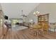 Dining area with wood floors and wooden dining set at 4521 Kingsmere # 6, Sarasota, FL 34235