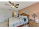 Spacious bedroom with king-size bed and ensuite bathroom access at 4521 Kingsmere # 6, Sarasota, FL 34235