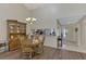 Bright dining area with hardwood floors and built-in hutch at 4521 Kingsmere # 6, Sarasota, FL 34235