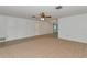 Living room with carpet and access to other rooms at 519 Bradenton Rd, Venice, FL 34293