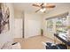 Spacious home office with a large closet and a window at 4405 Lenox Blvd, Venice, FL 34293
