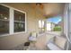 Comfortable screened porch with seating and a view at 4405 Lenox Blvd, Venice, FL 34293