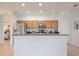 Kitchen features stainless steel appliances and wood cabinets at 4405 Lenox Blvd, Venice, FL 34293