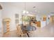 Modern dining area with kitchen views at 4405 Lenox Blvd, Venice, FL 34293