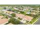 Community overview showing multiple homes and a pool at 4405 Lenox Blvd, Venice, FL 34293