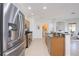 Stainless steel appliances and granite countertops in this kitchen at 4405 Lenox Blvd, Venice, FL 34293
