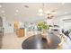 Open kitchen with stainless steel appliances and island at 4405 Lenox Blvd, Venice, FL 34293