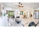 Spacious living area with open floor plan and adjacent dining area at 4405 Lenox Blvd, Venice, FL 34293