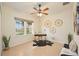 Bright home office featuring a desk, seating, and natural light at 4405 Lenox Blvd, Venice, FL 34293