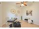Home office with a desk, seating area, and decorative wall art at 4405 Lenox Blvd, Venice, FL 34293