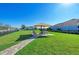 Relaxing common area with seating and shade structure at 2942 Trustee Ave, Sarasota, FL 34243