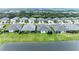 Aerial view of community homes by the lake at 2942 Trustee Ave, Sarasota, FL 34243