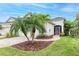 Front entrance with a screen door and walkway at 2942 Trustee Ave, Sarasota, FL 34243