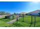 Fenced dog park with seating area and shade structure at 2942 Trustee Ave, Sarasota, FL 34243