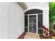 Screened entryway with access to the interior at 2942 Trustee Ave, Sarasota, FL 34243