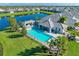 Resort-style pool with a large patio and gazebo at 2942 Trustee Ave, Sarasota, FL 34243