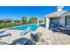 Community pool with lounge chairs and a patio area at 2942 Trustee Ave, Sarasota, FL 34243