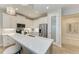 Kitchen with stainless steel appliances and white cabinets at 2942 Trustee Ave, Sarasota, FL 34243