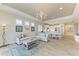 Open living area with a view of the kitchen and dining area at 2942 Trustee Ave, Sarasota, FL 34243