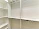 Walk-in closet with shelves and hanging rods at 2942 Trustee Ave, Sarasota, FL 34243