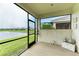 Covered porch with view of the lake at 2942 Trustee Ave, Sarasota, FL 34243