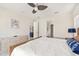 Spacious main bedroom with ensuite bathroom and walk-in closet at 2803 Butterfly Jasmine Trl, Sarasota, FL 34240