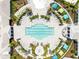 Resort-style pool with plenty of lounge chairs and umbrellas at 2803 Butterfly Jasmine Trl, Sarasota, FL 34240