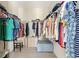 Spacious walk-in closet with ample hanging space and shelving at 2803 Butterfly Jasmine Trl, Sarasota, FL 34240