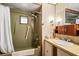 Clean bathroom featuring a shower/tub combo and vanity at 3410 Spanish Oak Ter, Sarasota, FL 34237