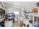 Laundry area with washer, dryer, and storage shelves at 3410 Spanish Oak Ter, Sarasota, FL 34237