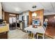 Bright kitchen features stainless steel appliances and a breakfast nook at 3410 Spanish Oak Ter, Sarasota, FL 34237