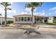 Charming single-wide manufactured home with carport and landscaping at 3410 Spanish Oak Ter, Sarasota, FL 34237