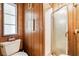 Small bathroom with a toilet and shower stall at 3410 Spanish Oak Ter, Sarasota, FL 34237
