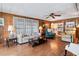Comfortable living room with hardwood floors and comfy seating at 3410 Spanish Oak Ter, Sarasota, FL 34237