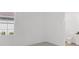 Bright bedroom with a view and an ensuite bathroom at 1217 Blue Shell Loop, Sarasota, FL 34240