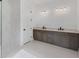 Bathroom boasts double vanity and large shower at 1217 Blue Shell Loop, Sarasota, FL 34240