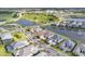 Aerial view of a luxury community with lakefront properties at 1217 Blue Shell Loop, Sarasota, FL 34240