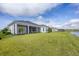 House with large backyard, screened patio and lake view at 1217 Blue Shell Loop, Sarasota, FL 34240