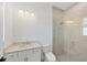 Clean bathroom with a walk-in shower and light vanity at 1217 Blue Shell Loop, Sarasota, FL 34240